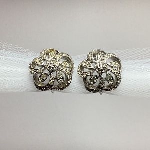 Vintage crystal swirl clip on earrings.
